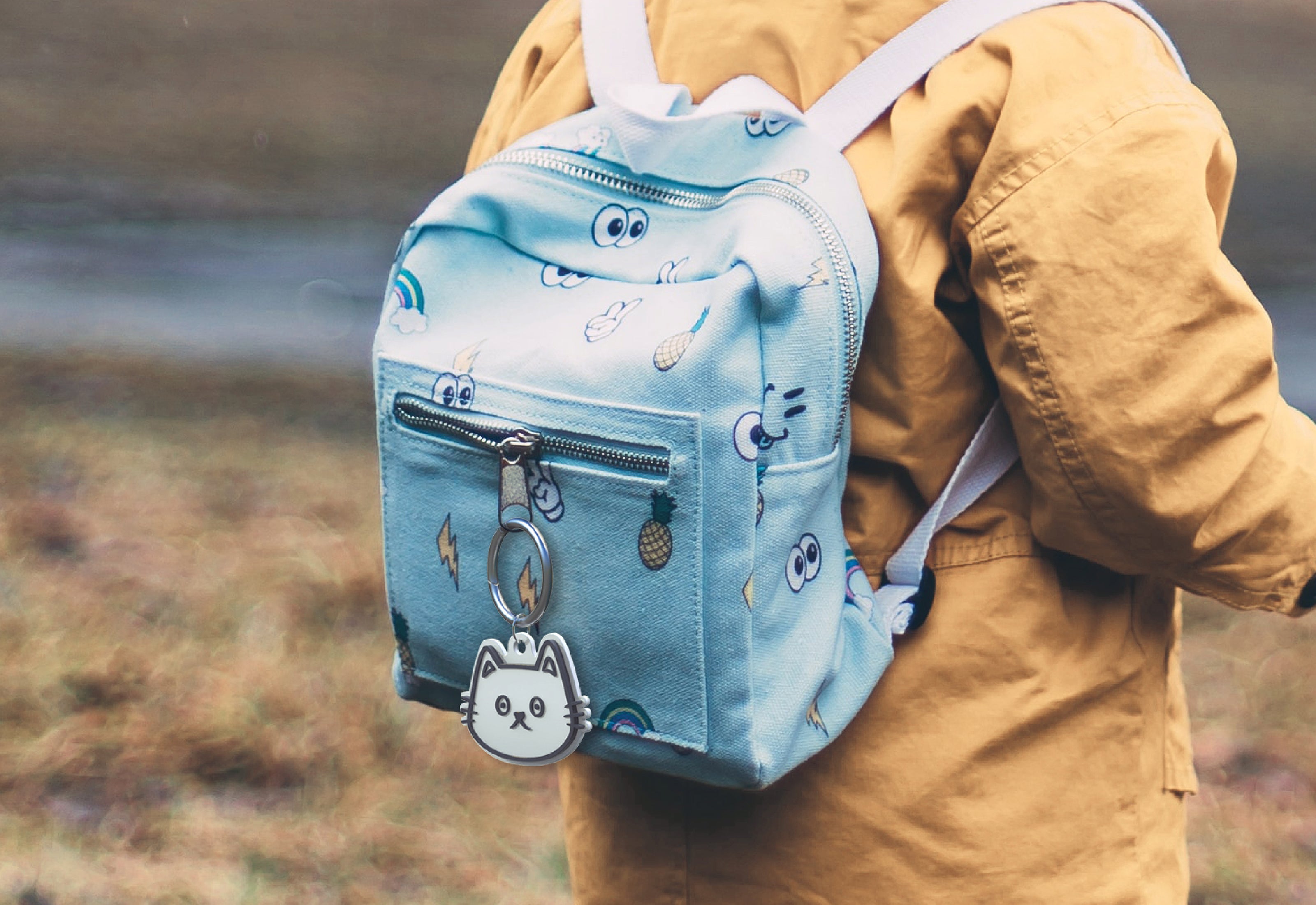 Casestudi AirTag Case with Cast cat design, perfect for hanging on backpacks, school bags, and outdoor gear. Ideal for keeping track of little kids and ensuring their safety in parks, outdoor spaces, or crowded areas.