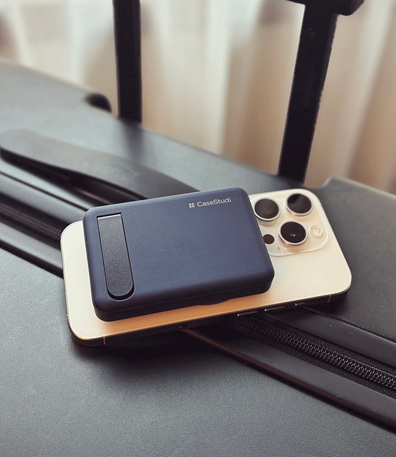 FlashMini Stand: A lightweight 167g power hub with a built-in stand for hands-free video viewing. Features MagSafe compatibility, dual USB-C and USB ports, and fast charging that powers an iPhone 15 Pro Max from 0 to 50% in 30 minutes. Compact and versatile, it charges up to three devices simultaneously, perfect for on-the-go use.