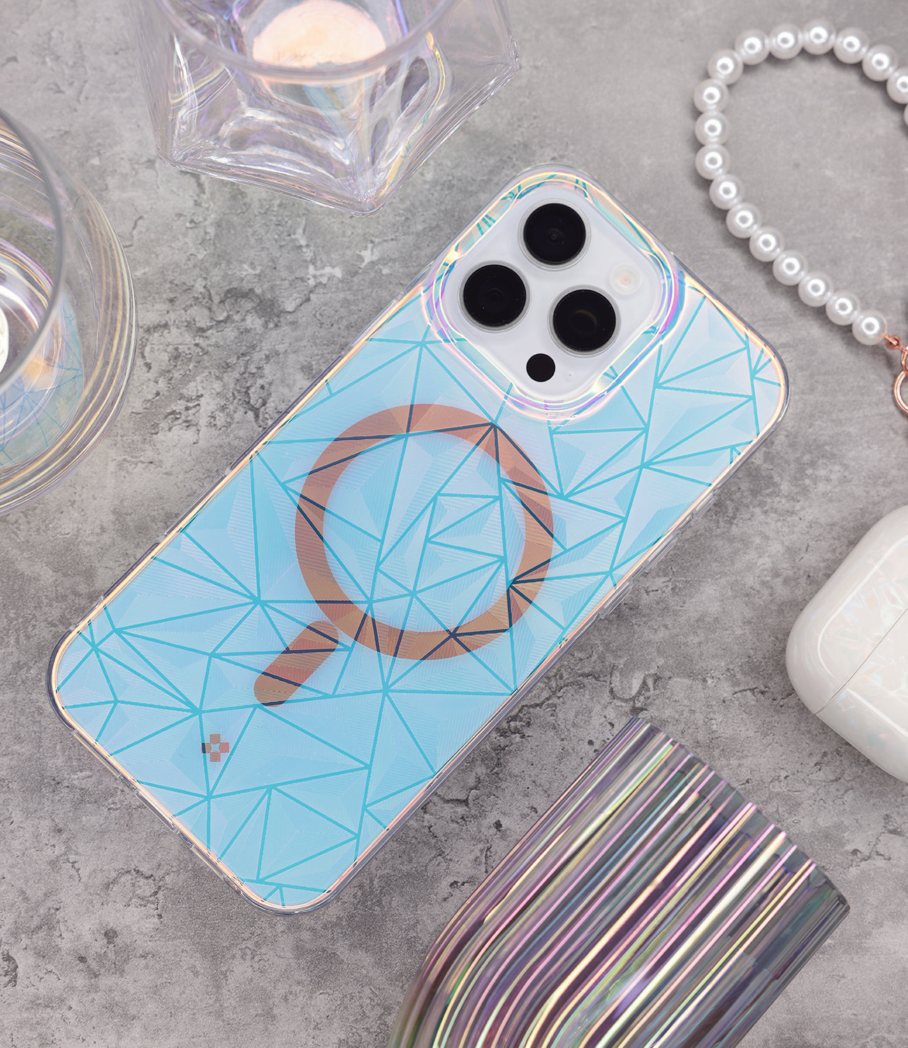 The Gala Case for iPhone 16 / 16 Pro series delivers a perfect balance of simplicity and allure. Its holographic diamond pattern catches the light, creating mesmerizing color shifts that enhance its streamlined, low-profile design. With reliable durability and MagSafe compatibility, it seamlessly combines practicality with eye-catching beauty.