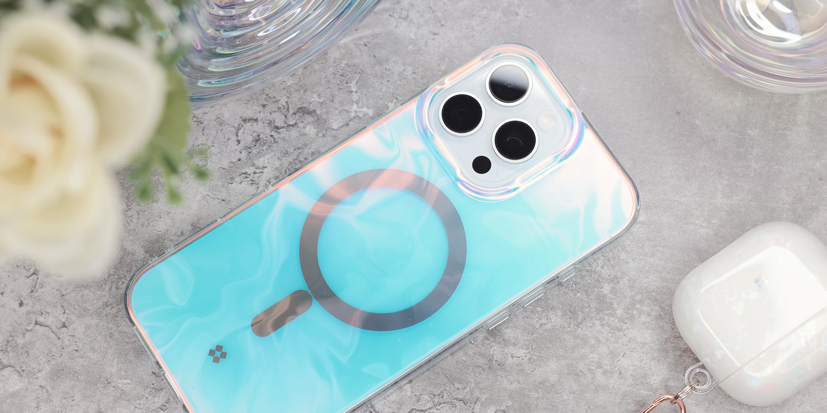 Experience elegance reimagined with the Casestudi Gala Case for iPhone 16 / 16 Pro series. Featuring a subtle silk-like wave pattern, this low-profile case radiates charm as it shimmers and shifts colors under light. Lightweight yet durable, it offers reliable protection while maintaining a sleek aesthetic. Fully MagSafe compatible, the Gala Case seamlessly integrates style and practicality for your everyday needs.