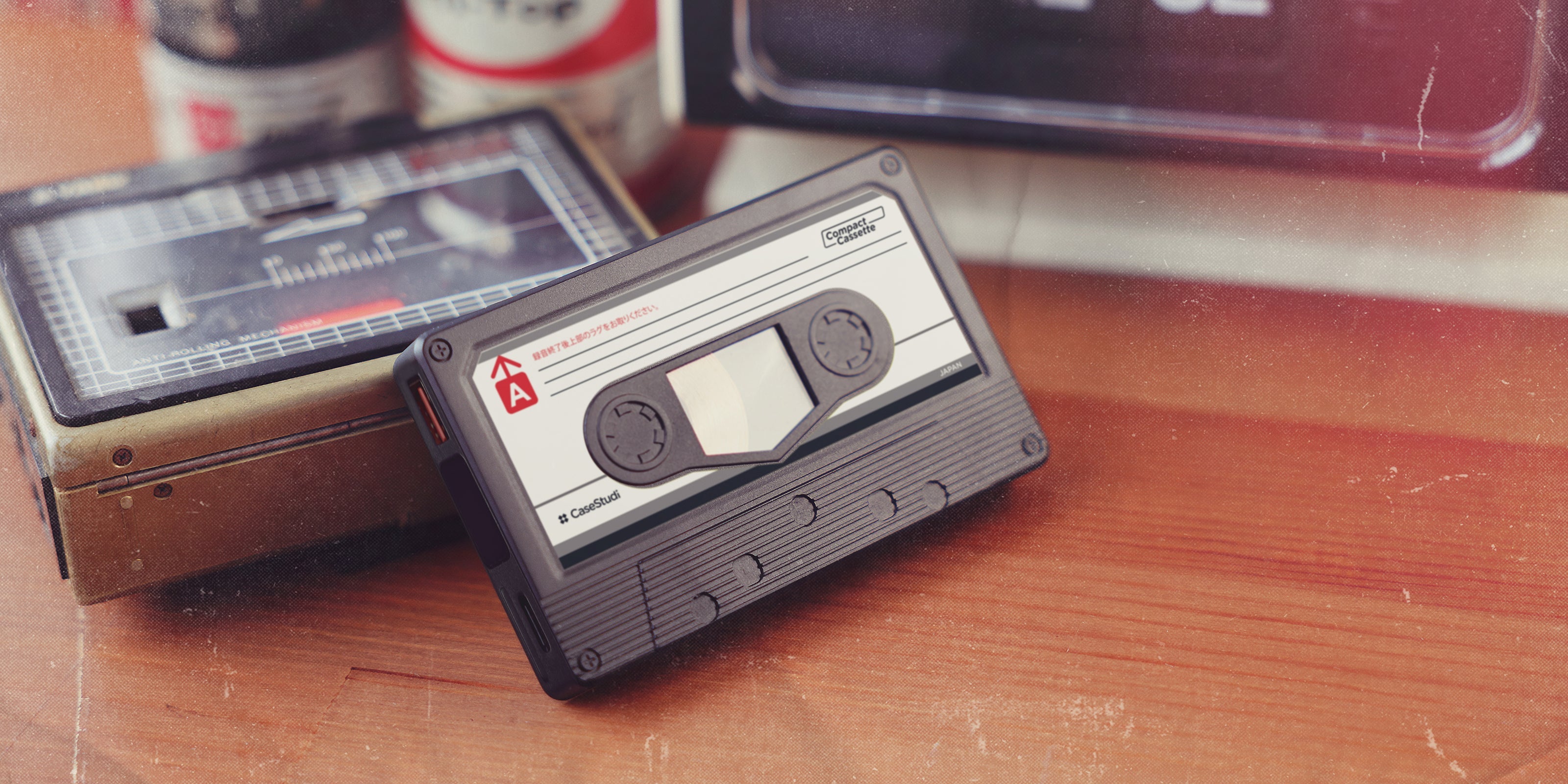 Casestudi Flashtape: 5000mAh power bank with USB-C (20W max), USB-A (22.5W max), wireless charging (15W max), LED display, and retro cassette design.