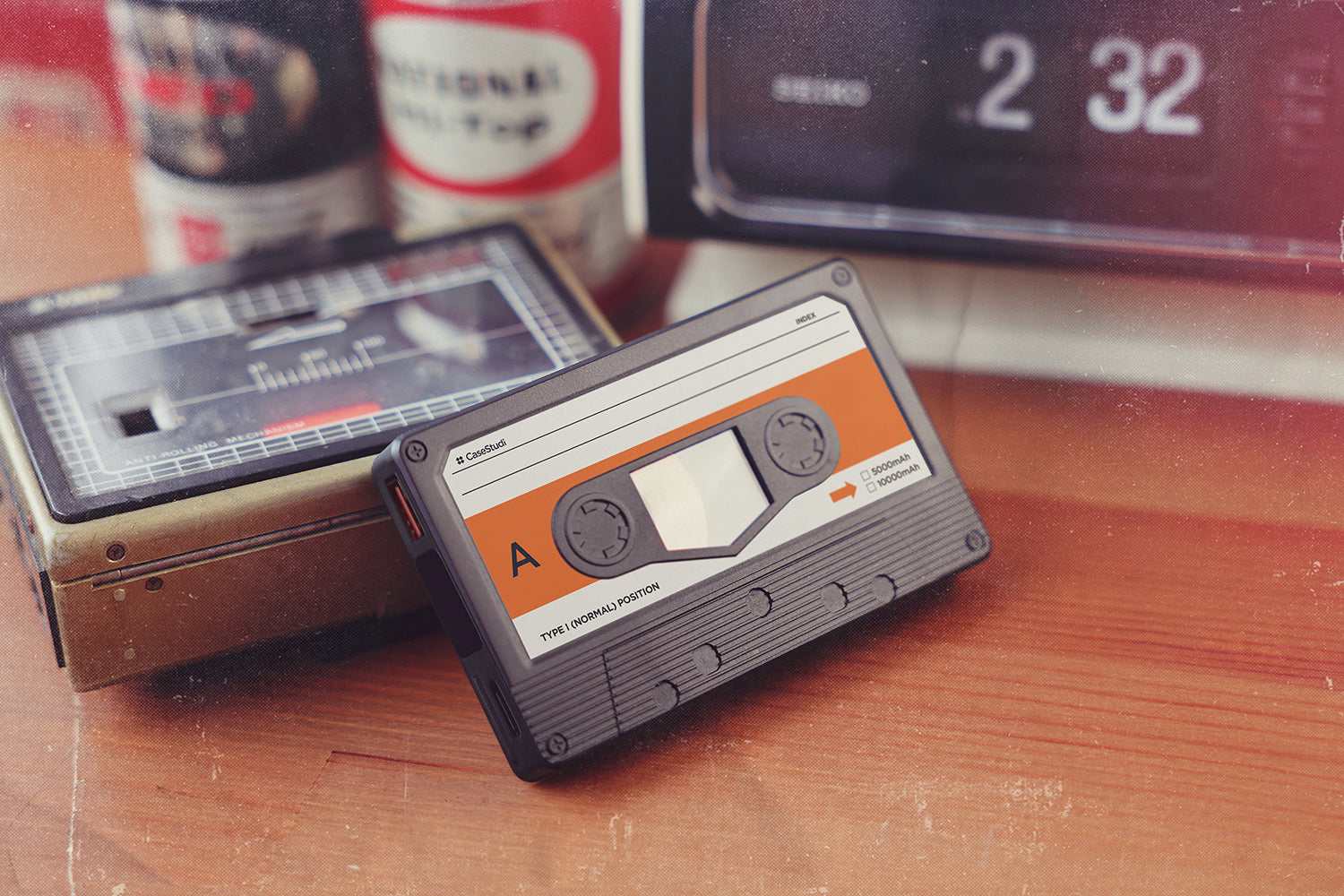 Casestudi Flashtape Power Bank: 5000mAh cassette-inspired design alongside a classic Walkman, featuring MagSafe compatibility, dual ports, fast charging, and LED display—blending nostalgia with modern tech.