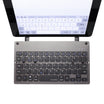 Casestudi Foldboard Stand with stand holding an iPad, highlighting its functionality and compact design.