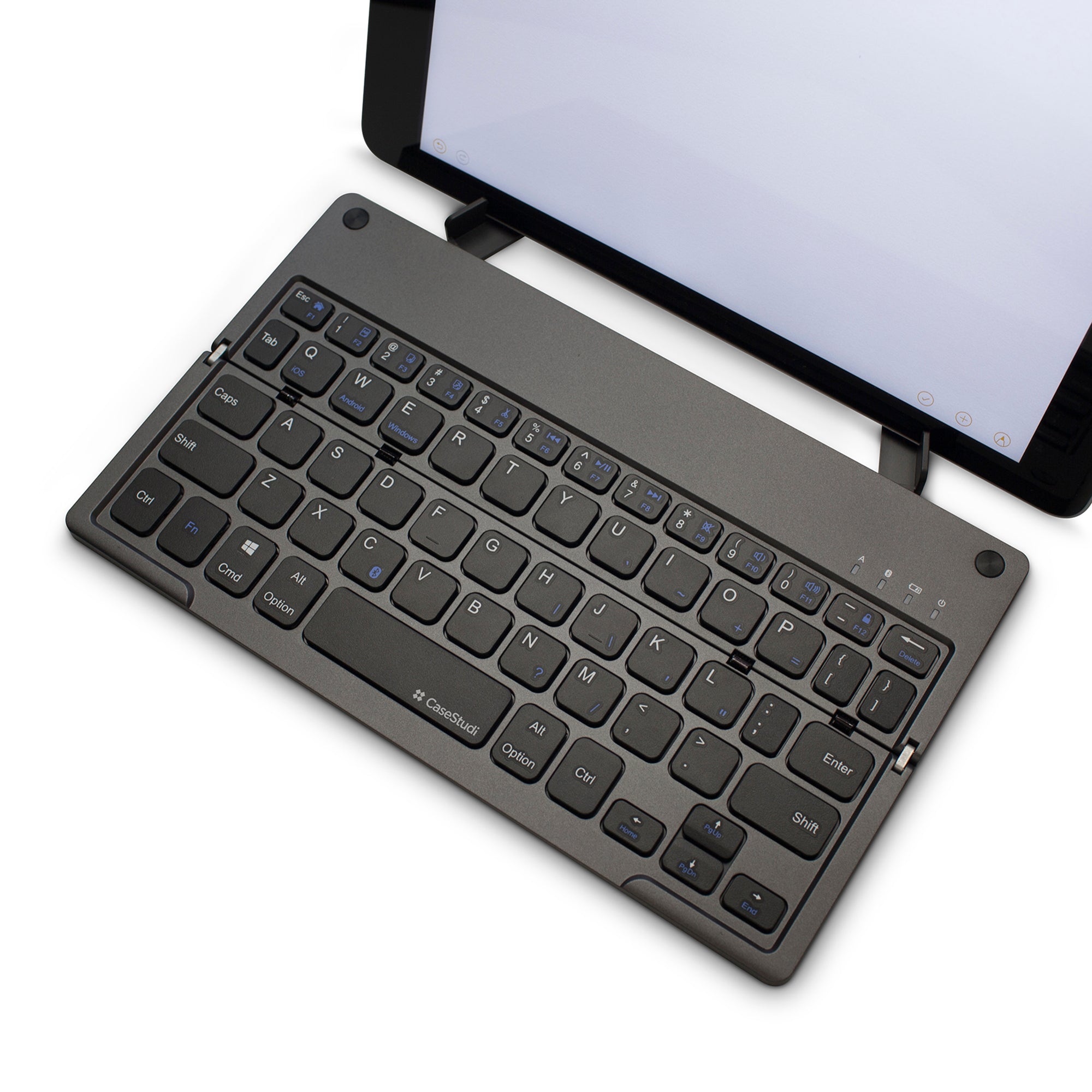 Casestudi Foldboard Stand unfolded with an open stand holding a tablet, demonstrating its functionality and compact design.