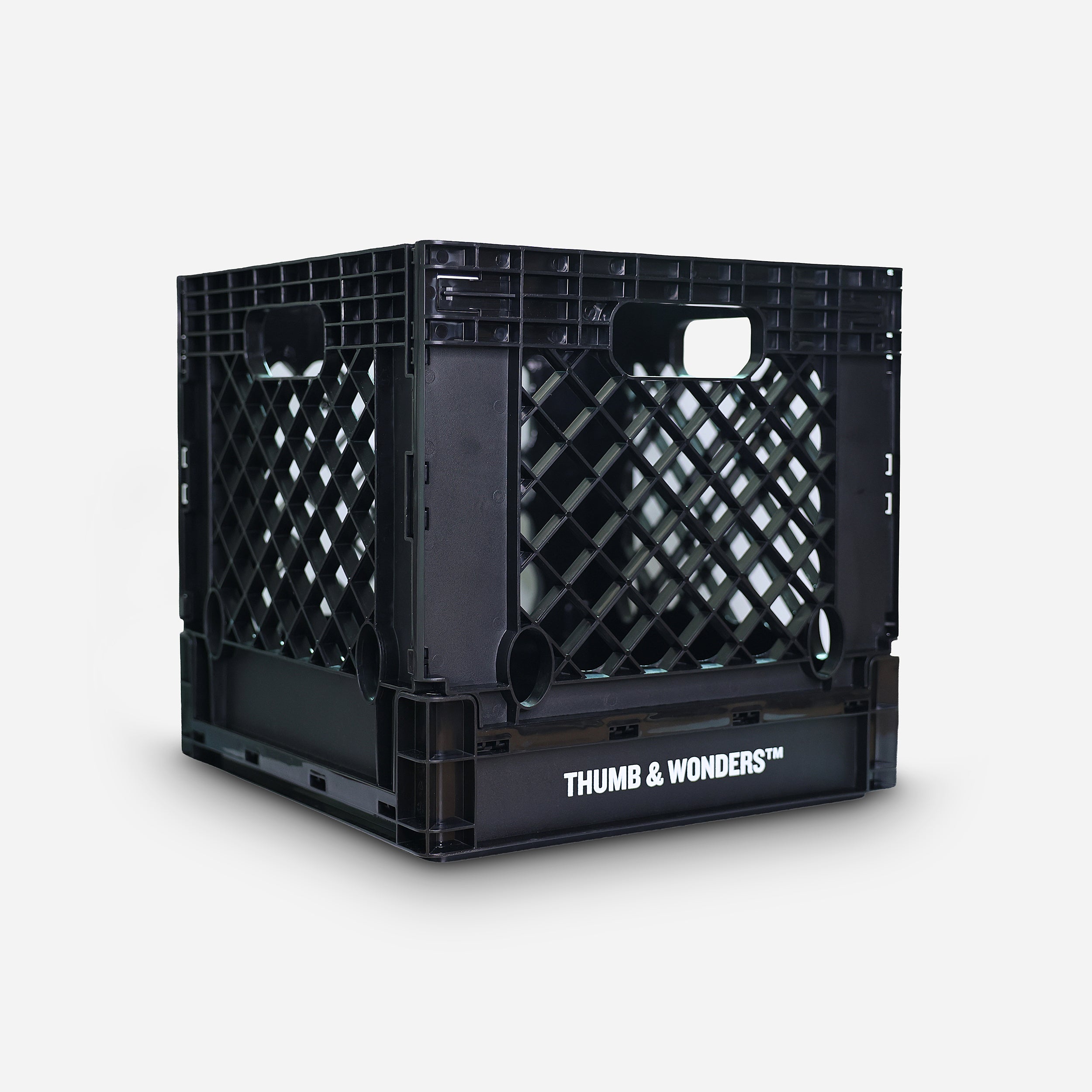 Thumb & Wonders black heavy-duty foldable crate, engineered from premium PP material with a minimalist industrial grid design. 